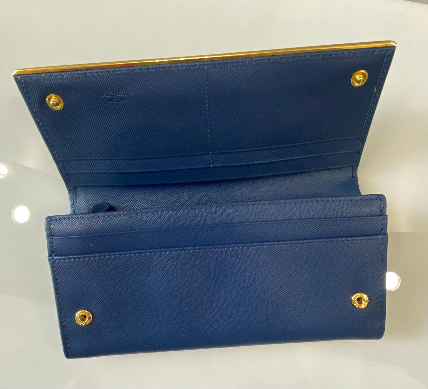 PRADA SAFFIANO LEATHER METAL FRAME FLAP CONTINENTAL WALLET