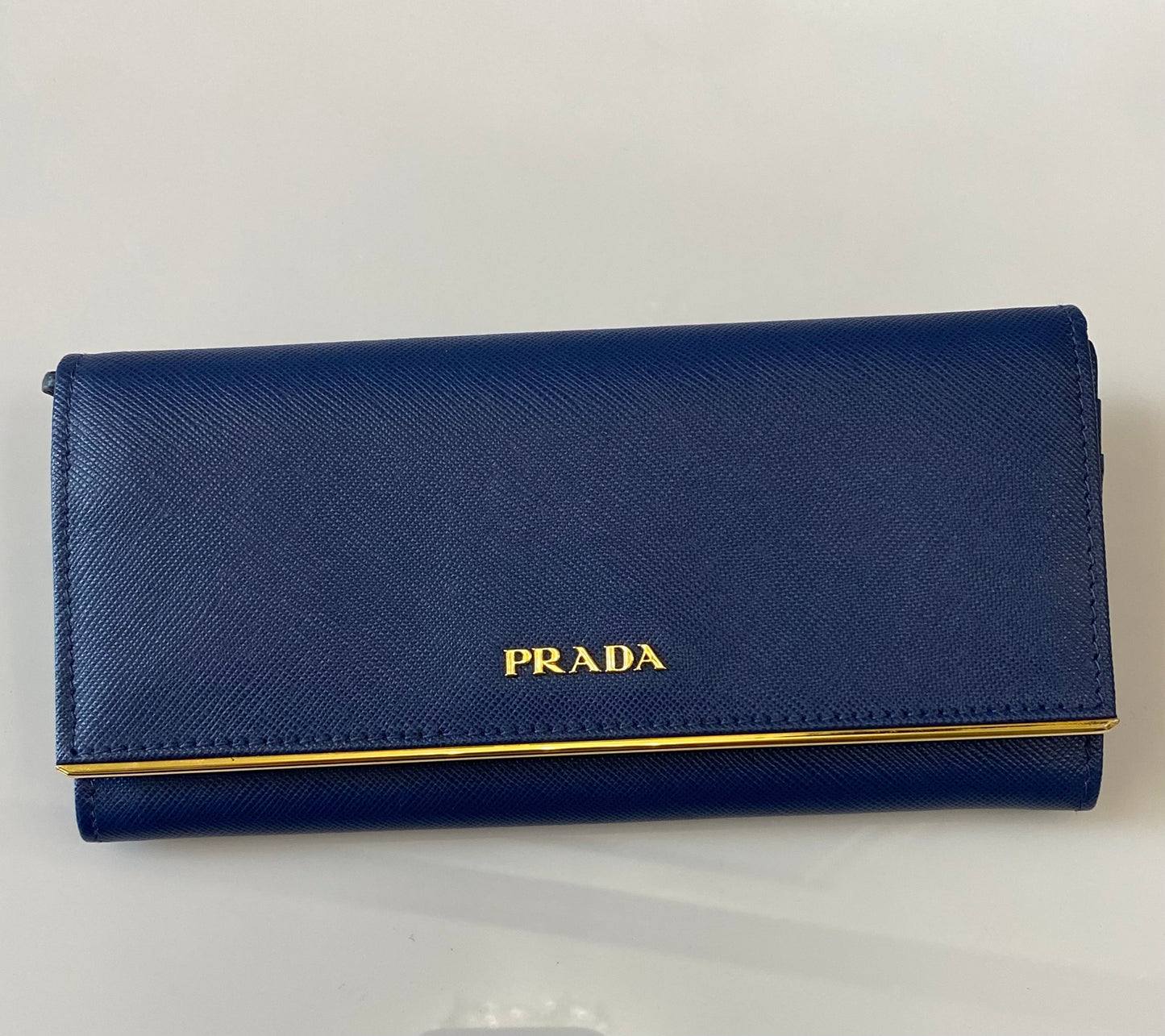 PRADA SAFFIANO LEATHER METAL FRAME FLAP CONTINENTAL WALLET