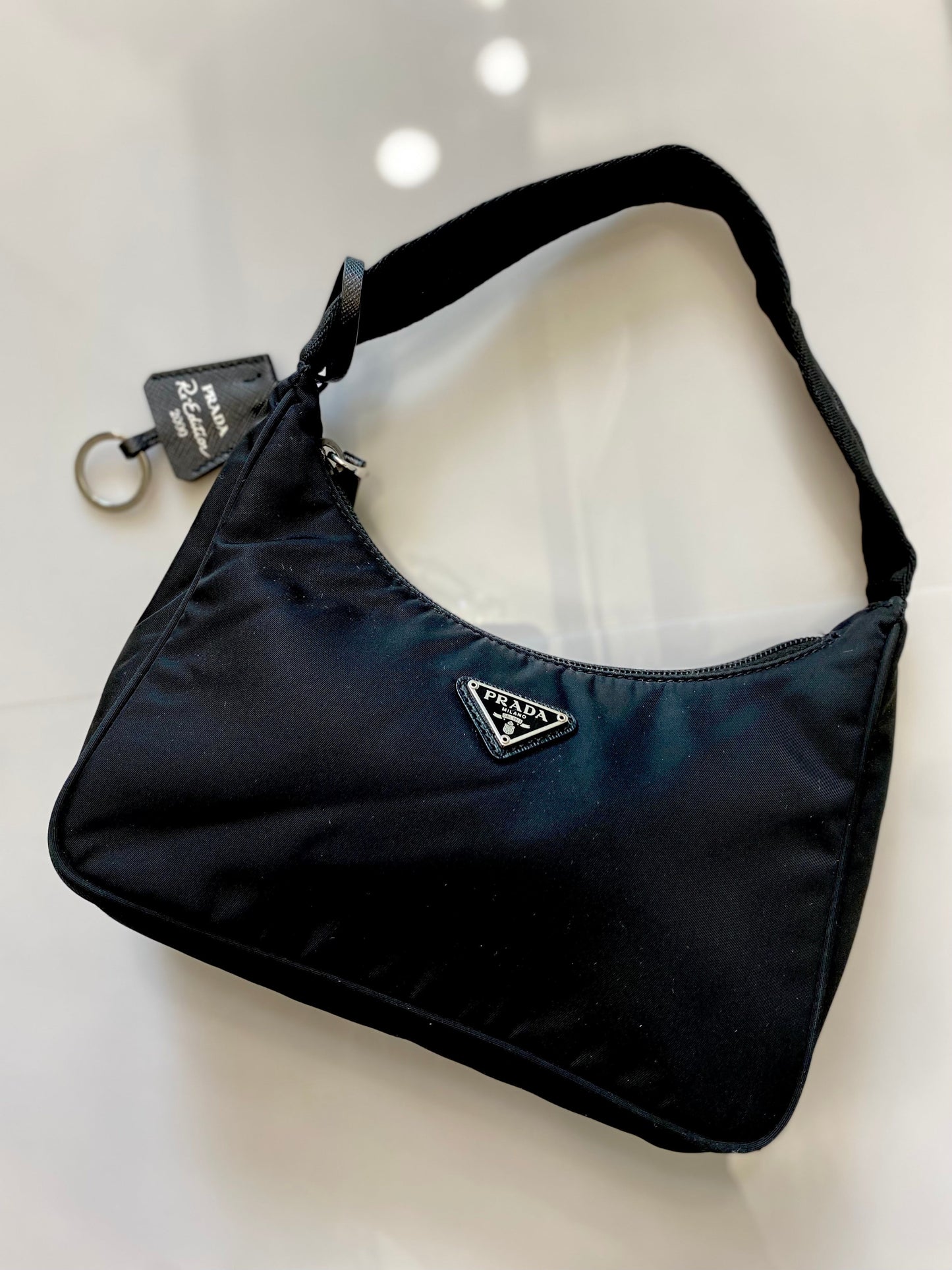 PRADA RE-EDITION 2005 MINI TESSUTO BAG