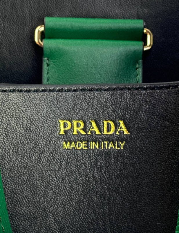 Prada Panier bag in Saffiano leather mango